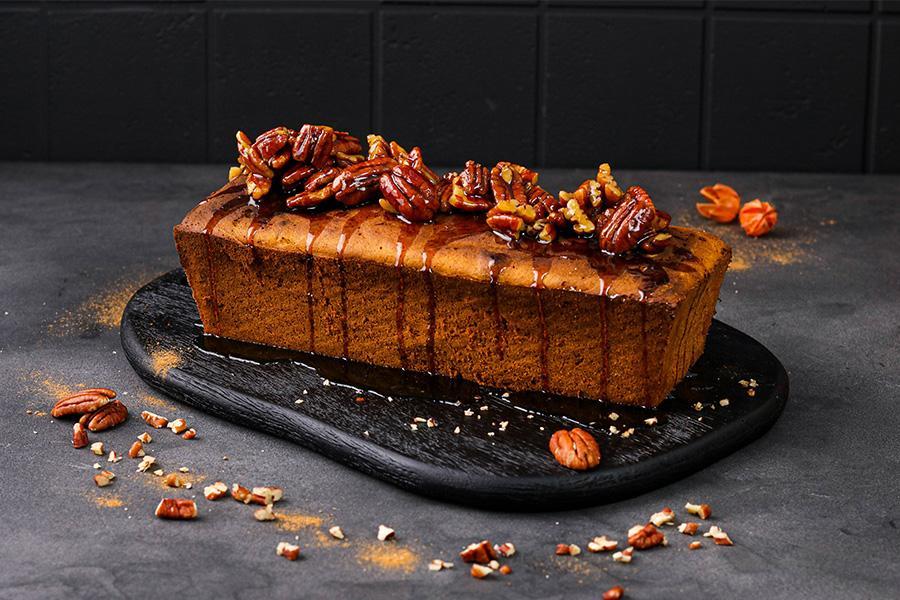 Süßes Kürbis-Bananenbrot mit angemachten Pekannüssen - Schritt 7